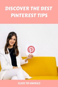 a woman sitting on top of a yellow couch holding up a pinterest sign