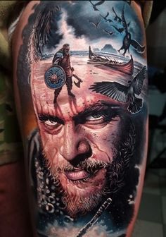 a man's arm with a tattoo on it and an image of a person in the background