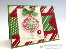 a christmas ornament card with a green bow