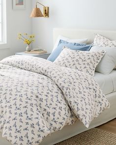 Here's another reason to love to snuggle up: this organic-cotton flannel bedding is woven in Portugal and brushed on both sides for softness. The small-scale floral print has big impact on any bed, blooming beautifully on its own or mixed and matched with solid colors. 100% organic cotton. Gently brushed multiple times on each side until it meets our exacting standards for softness. This product meets STANDARD 100 by OEKO-TEX certification. The small-scale floral print was created in-house by blending two vintage florals from the Garnet Hill archives. Sheets sold separately and designed to mix and match. Fitted sheet is fully elasticized for a better fit and easily accommodates mattresses up to 12 inches for Twin and Double, and up to 15 inches for Queen, King, and California King sizes. D Navy Blue And White Duvet Cover, Dainty Floral Sheets, Cute Comforters, Coastal Farmhouse Bedroom, Navy Blue Bedding, Designing A Room, Costal Granddaughter, Percale Duvet Cover, Our First Apartment