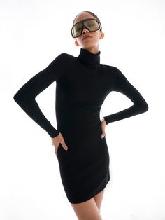 Maybe the easiest, most satisfying purchase you will make this Fall. The turtleneck mini dress joins the ranks of our basic core collection, now in timeless, classic black. Simple, yet sexy, but also sophisticated. All the things. Our custom-dyed eco-merino fabrication is a combination of biodegradable extra-fine merino wool, plant-based viscose and recycled Lycra. It’s just as soft as peachskin but has a warmer, wooly hand feel, perfect for the colder winter months. Some pilling may occur, but Turtleneck Dress For Night Out, Bodycon High Neck Mini Dress For Work, High Neck Bodycon Mini Dress For Work, Elegant Turtleneck Mini Dress For Fall, Sleek Turtleneck Workwear Dresses, Chic High Neck Solid Mini Dress, Elegant Turtleneck Dress, Sleek Fitted Mini Dress For Winter, Stretch Turtleneck Mini Dress For Night Out