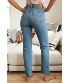 RESTOCKED- BESTSELLER! These faded straight-leg jeans cut from nonstretch denim and liberally detailed with dashes of destruction are proof that quality never goes out of style. 29 1/2" inseam; 14" leg opening; 11 1/2" front rise; 15 1/2" back rise (size 29) Button fly Five-pocket style 100% cotton Machine wash, tumble dry Imported Women's Clothing SIZE INFO True to size. 23=000, 24=00, 25=0, 26=2, 27=4, 28=6, 29=8, 30=10, 31=12, 32=14, 33=16, 34=18 (14W-16W). High rise.