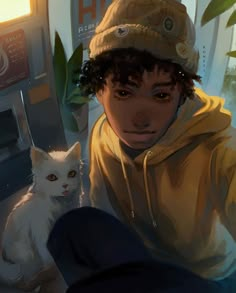 a young man sitting next to a white cat