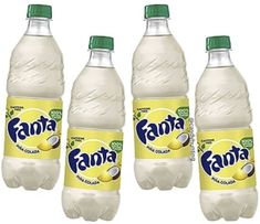 four bottles of fanta lemonade on a white background