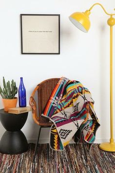 two pictures one with colorful pillows and the other with decorative rugs