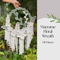 the macrame floral wreath is made with yarn