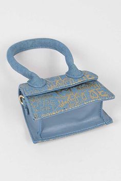 This SMALL item makes a BIG statement! A denim mini coin purse adorned with gold graffiti writing. Pair with our Graffiti Denim Wide Waist Belt to make your own STATEMENT! Width - 7"Width - 4.8"Height - 3"Depth - 1.8"Composition - Denim & Mix MetalsLead & Nickel Compliant Made In CHINA Gold Graffiti, Wide Waist Belt, Graffiti Writing, Mini Coin Purse, Wide Waist, Denim Mini, Waist Belt, Gym Bag, Make Your Own