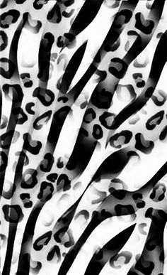 black and white photograph of an animal print pattern with zebra stripes in the background,