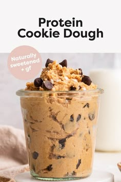 a glass jar filled with cookie dough and chocolate chips