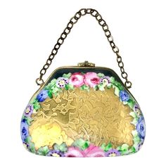 An enchanting porcelain trinket box in the form of a handbag with a chain handle, richly gilded with high karat gold and fired vitreous enamel hand painted floral designs.  Marked "Limoges France, Paint Main (hand painted)". Dimensions: 2.2"W x 1.35"D x 1.5"H (not including chain) Victorian Gold Bag As Gift, Antique Gold Bag For Gift, Vitreous Enamel, Limoges Boxes, China Painting, Limoges France, Deco Jewelry, Art Deco Jewelry, Porcelain Painting