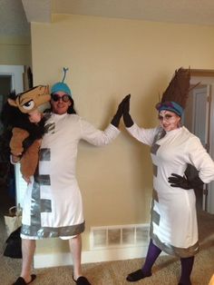 two people in costumes standing next to each other