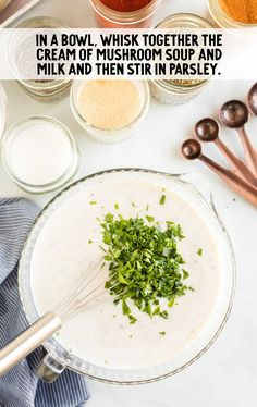 the ingredients to make this dish are in bowls and on top of a table with spoons