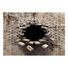 an old brick wall with a hole in the middle and bricks falling out from it