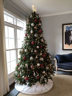 a decorated christmas tree in a living room