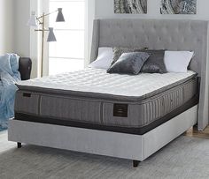 the mattress is made up and ready to be used in the bedroom or living room