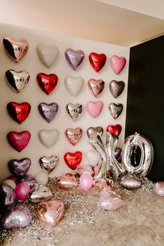 Heart balloons 
Balloons 
Valentine’s Day 
Vday 
Galentines 
Party
Pink
Purple 
Foil balloons 
Backdrop
Photo booth
White 
Red 
Silver 
Rose gold 
People Galentines Balloon Wall, Balloon Heart Backdrop, Valentines Wall Decorations, Heart Balloons On Wall, Easy Valentines Backdrop, Valentines Day Brunch Decorations, Galentine's Party Decor, Heart Balloon Wall Backdrop, Valentine’s Day Wall Decor