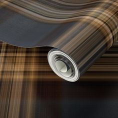 an abstract photo of a black and brown wallpaper with stripes on it's surface