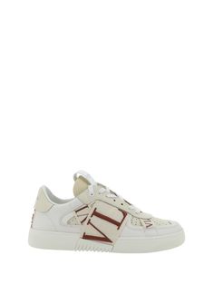 Calfskin vl7n sneakers by valentino garavani, perforated round toe, flat sole, front lace-up closure, contrasting embroidered logo label on front tab, paneled design, webing bands with contrasting iconic brand monogram applied to side panels. Composition: 100% % Rubber, 100% % Calf Leather Bos Taurus Flat Top Sunglasses Women, Valentino Garavani Sneakers, Valentino Sneakers, Brand Monogram, Flat Top Sunglasses, White Shoes Women, Logo Label, Latest Sneakers, White Flats