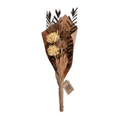 a bouquet of dried flowers and leaves is wrapped in brown paper on a white background