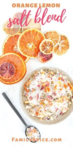 an orange lemon soft blend in a bowl next to sliced oranges and other fruit