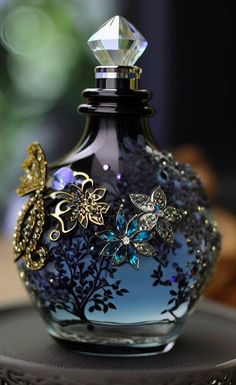 a blue glass bottle sitting on top of a table