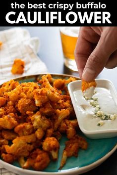 the best crispy buffalo cauliflower is served with ranch dressing