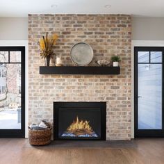 a living room with a fire place in it