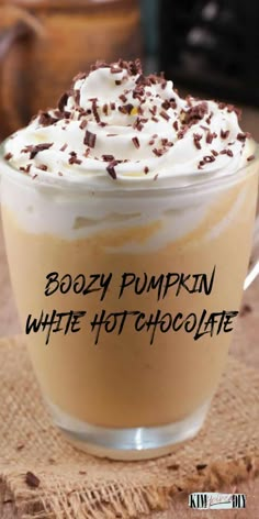 boozy pumpkin white hot chocolate in a glass mug