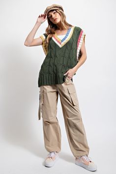 This Multi-Color Knitted Sweater Vest offers an oversized boxy-fit with classic cable knit design and twisted pattern. The pullover vest features a V-neckline and cap sleeves, making it perfect for any season.Imported95% Polyester 5% Spandex EASSIZE CHART:S (3) : bust 33-34 in, waist 25 in, hips 35-36 in (5) : bust 34-35 in, waist 26 in, hips 36-37 inM (7) : bust 36-37 in, waist 27 in, hips 37-38 in (9) : bust 37-38 in, waist 28 in, hips 38-39 inL (11) : bust 39-40 in, waist 29-30 in, hips 39-40 Cardigan Vest Outfits For Women, Green Cargo Vest Outfit, Oversized Sweater Vest, Knitted Sweater Vest, Pullover Vest, Teacher Wardrobe, Cable Knit Vest, Twist Pattern, Oversized Silhouette