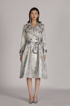 Silver Flora trench coat is uniquely crafted with adjustable straps on waist and cuffs, which ensures the tailored fit and perfect level of snugness and comfort. This coat excels in durability and wind resistance. Material: Cotton, Nylon Silver Trench Coat, Trench Coats, Classy Outfits, Designer Fashion, Trench Coat, Adjustable Straps, Fashion Design, Silver, Clothes