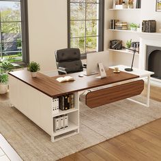 an office desk in front of a fireplace