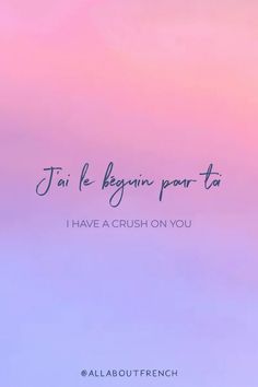 a pink and blue sky with the words i have crush on you written in french