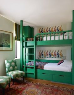 a bedroom with bunk beds and green furniture