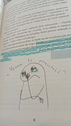 an open book with a drawing of a bird on it's face and words written in spanish