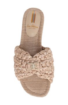 A sparkling logo adds a signature flourish to a sophisticated sandal topped with braided straps. Textile upper/synthetic lining and sole Imported Synthetic Slides With Braided Straps For Vacation, Luxury Braided Beach Sandals, Luxury Braided Ankle Strap Sandals, Vacation Slides With Braided Synthetic Straps, Chic Straw Sandals With Cork-bed Midsoles, Braided Strap, Flip Flop Slippers, Baby Boy Shoes, Sweaters And Leggings