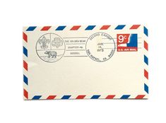 an air mail envelope with stamps on it