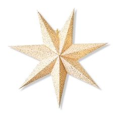 a white and gold christmas star hanging from the ceiling