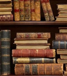 an old book shelf filled with lots of books