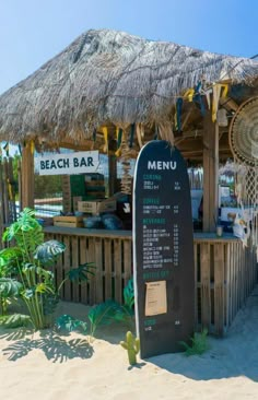 a tiki bar is set up on the beach