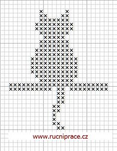 a cross stitch pattern with the shape of a tree in black and white, as well as