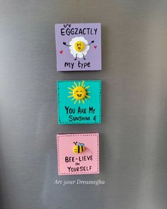 three magnets on the side of a refrigerator saying, you are my sunshine, bee i love yourself