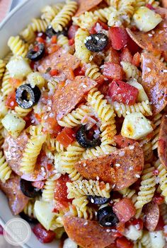 pasta salad with pepperoni, olives and tomatoes