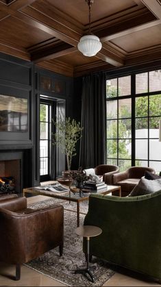 a living room filled with furniture and a fire place