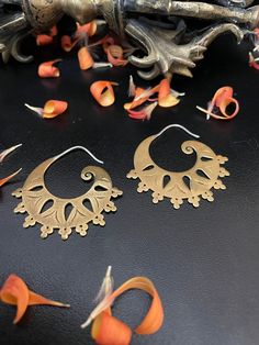 Hoop Earrings with cut-out Design, Brass, hinged clasp. Perfect for your Collection of accessories. Circumference: 1 1/4" Open studio most days from 10:00 to 5:00, DM, make an appointment to have an adventure in shopping. Yes ~ along with basic simplicity, It's all about you You deserve to know about my fabulous Treasure chest. Tribal Jewelry, Statement Piece Handmade Jewelry, Art to Wear, with Much Much More. Looking for more Treasures, Or would like to purchase, let your fingers do the shopping xoxo On My ETSY HeartbeatHandmade https://www.etsy.com/shop/HeartbeatHandmade Gold Hoop Earrings With Pierced Copper, Symbolic Round Pierced Hoop Earrings, Bronze Hoop Pierced Earrings, Artistic Metal Hoop Earrings Nickel Free, Artistic Nickel-free Metal Hoop Earrings, Symbolic Round Metal Hoop Earrings, Unique Metal Hoop Earrings, Pierced Copper Hoop Earrings, Small Hinged Hoop Earrings As Gift