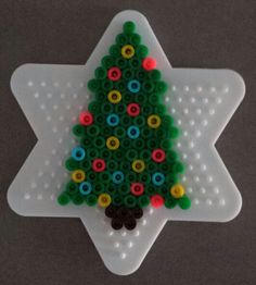 a christmas tree made out of plastic beads