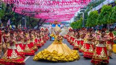 a group of people dressed in colorful costumes