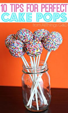 cake pops in a glass jar with sprinkles