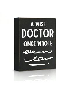 a black box with white writing on it that says, a wise doctor once wrote