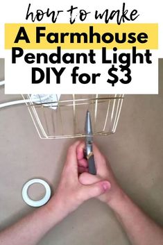 a hand holding a pen with the words how to make a farmhouse light diy for $ 3