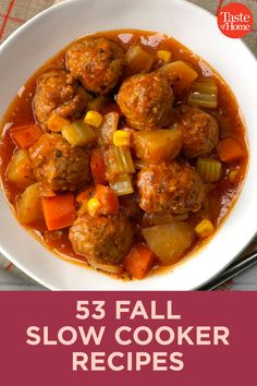 a white bowl filled with meatballs and vegetables